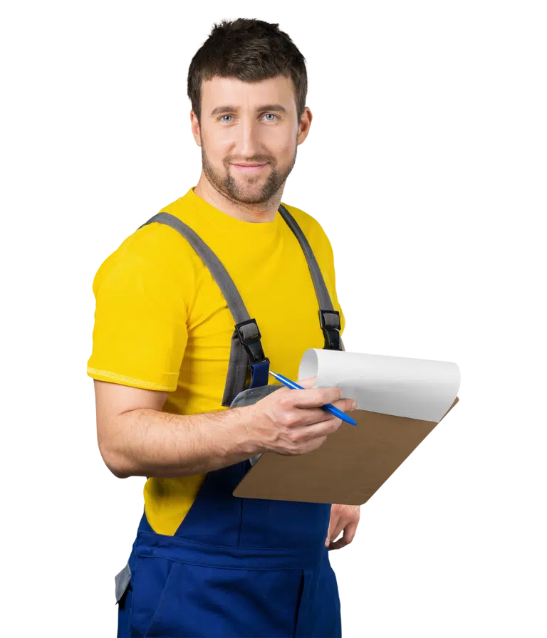 Man posing with a yellow shirt, blue overalls, and a clip board in his hand