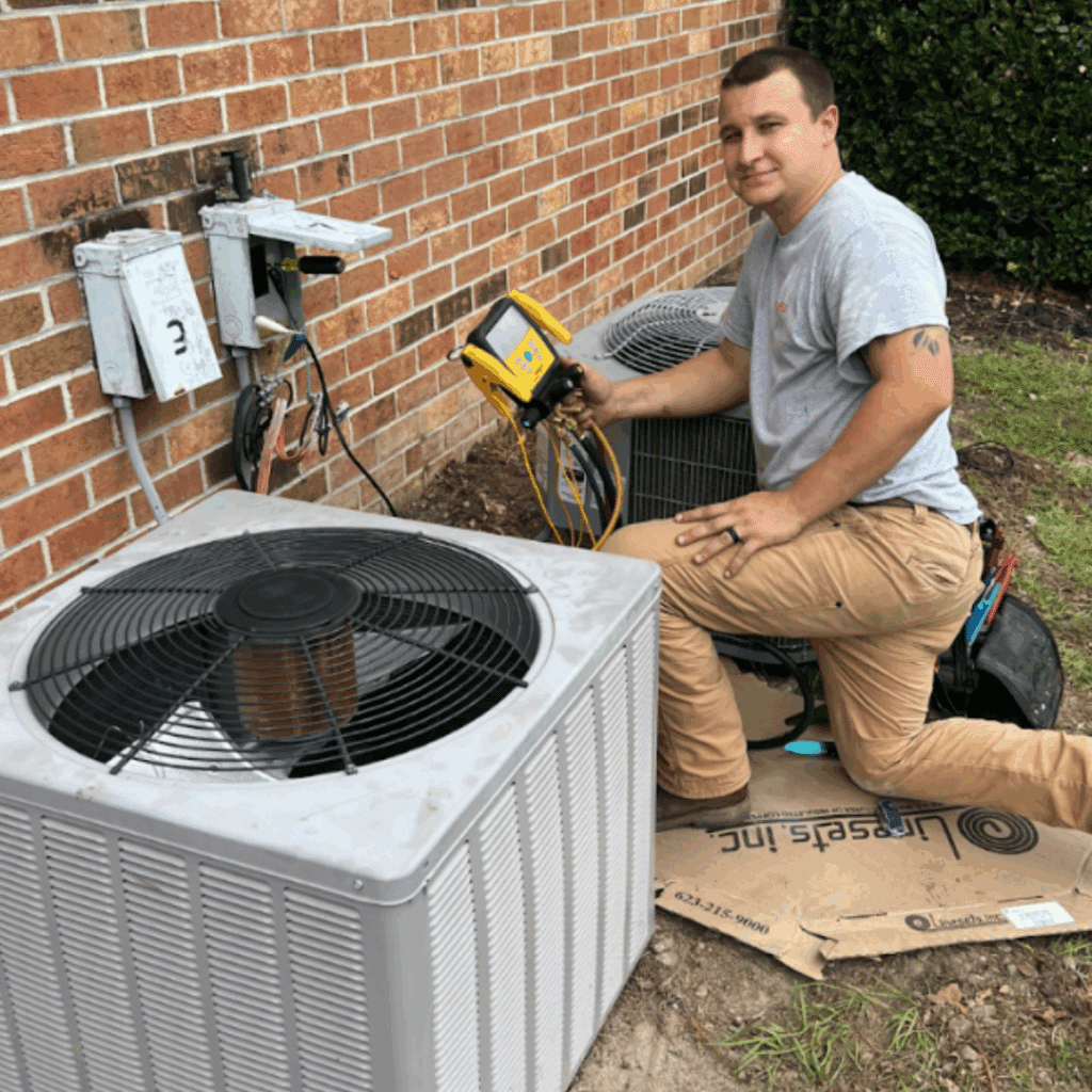 a polar express employee working on an hvac unit
